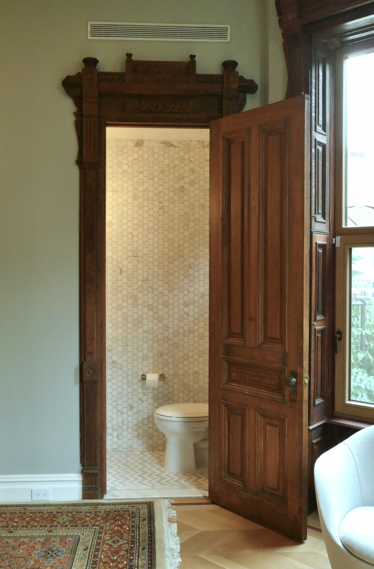 Powder room at living room Photo credit: MESH Architectures